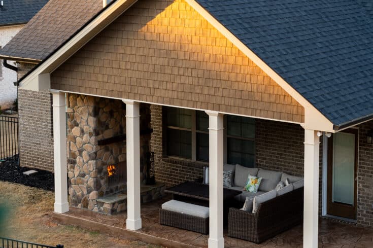 Covered Stamped Wood-like Concrete Patio with Mason Fireplace || Simple Luxury Patio Living
