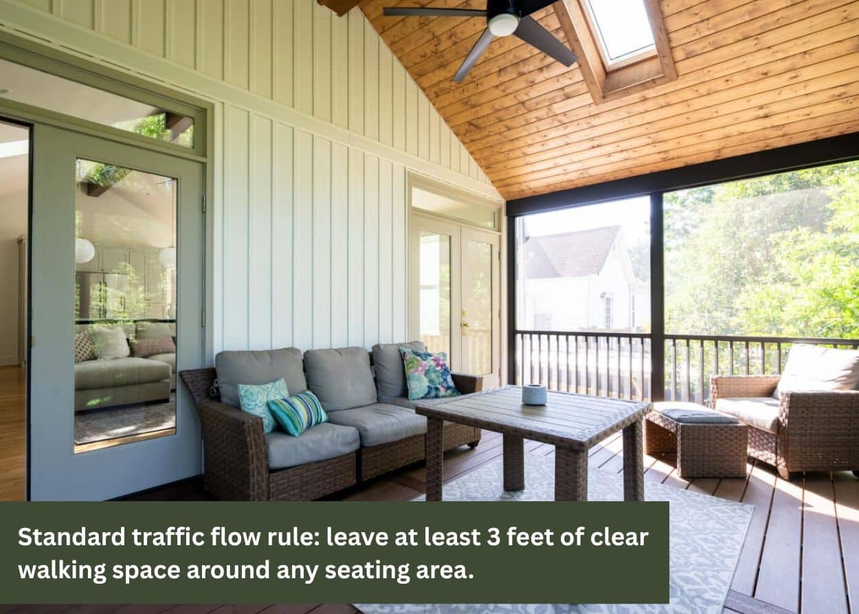 Covered deck with comfortable outdoor seating and dining area for relaxing and entertaining.